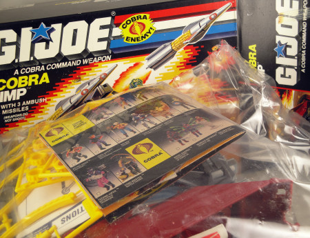 The 1988 G.I. Joe Cobra Imp box opened, toy still bagged. I know just what to do to solve the sealed bag problem . . . hello, scissors! Click to enlarge image.